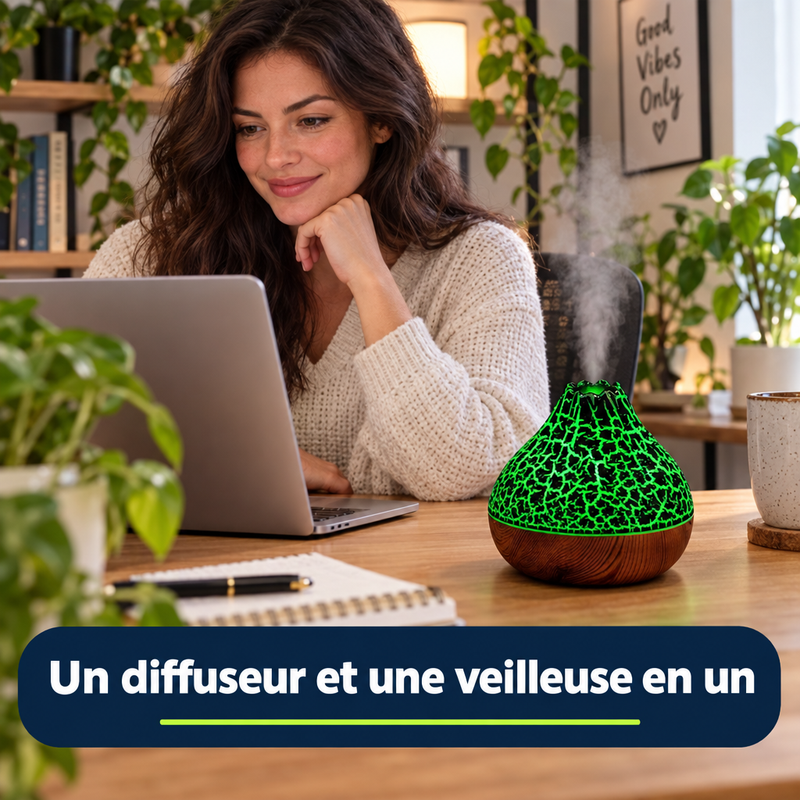Un diffuseur et une veilleuse en un : VolcanMist près d'un ordinateur portable